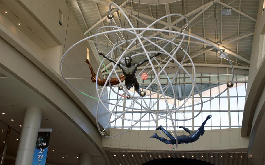 The 'Searching for the Sun' exhibit at the Gwacheon National Science Museum in Seoul shows the path of the sun and the eight planets in our solar system.