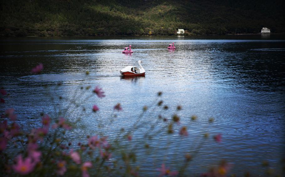 Visitors to Lake Haruna enjoy their time out on the lake in stylish swan boats that seat two.