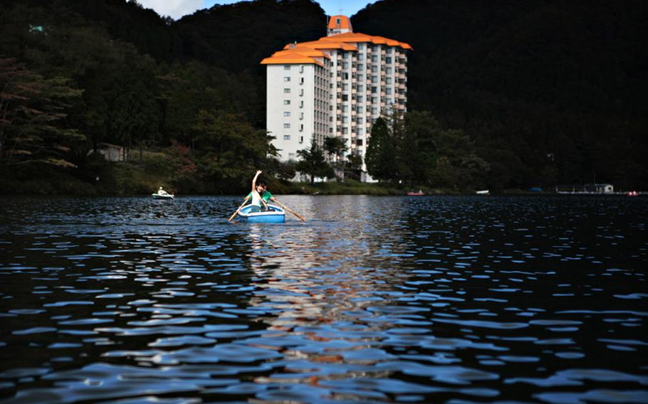 Some friends enjoy a nice paddle in a rented boat out on Lake Haruna.