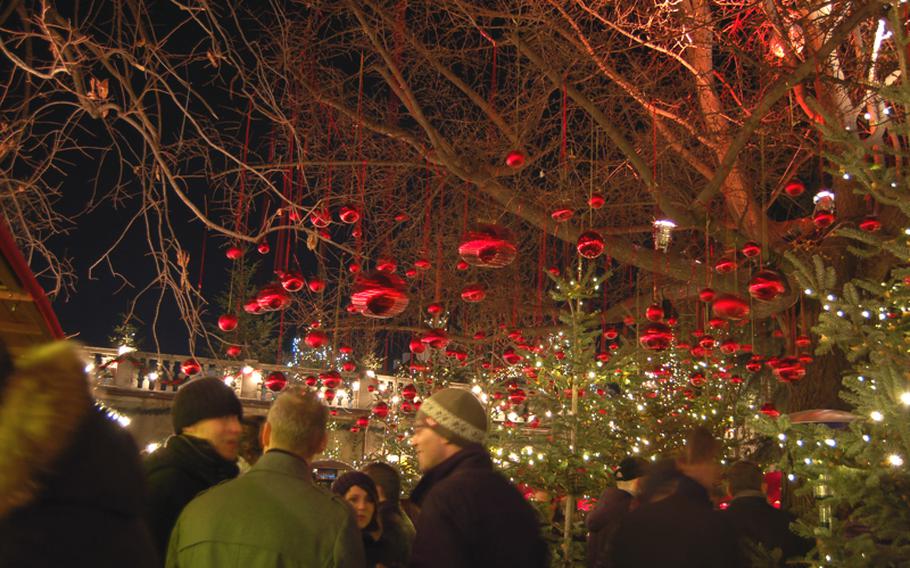Most booths in Bolzano's Christmas market close at 7 p.m., with those serving hot beverages -- many containing various levels of alcohol -- being the exception. Adults gathered in the 'Enchanted Forest' last year, sharing drinks and conversation.