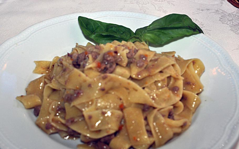 First courses offered at Grappolo D'Oro, an osteria/trattoria located about 18 miles east of Aviano, include pappardelle with duck sauce (as pictured), gnocchi with cheese and bean and barley soup.