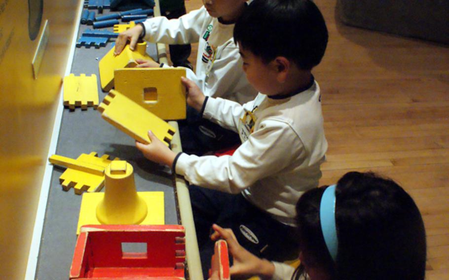 Children play with blocks Nov. 22 at the Children's Museum at the National Museum of Korea.