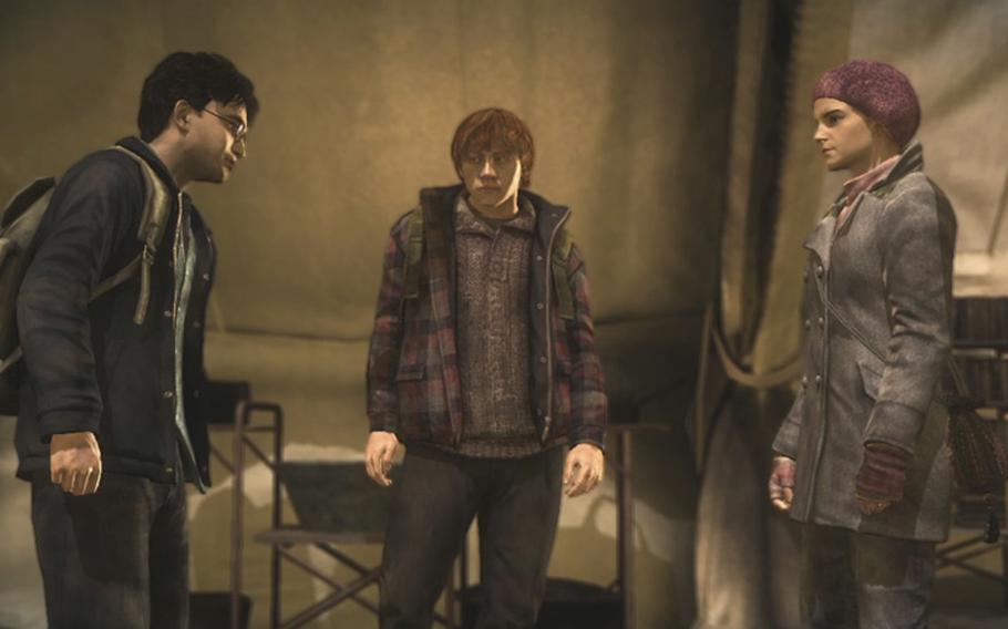 Harry, from left, Ron and Hermione discuss matters in 'Harry Potter and the Deathly Hallows — Part 1.'