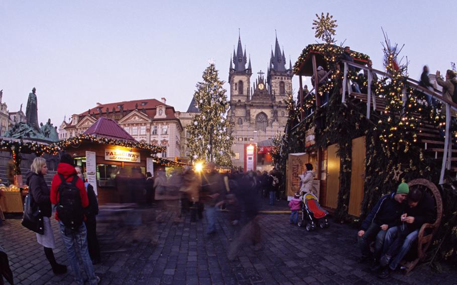 In Prague's Old Town Square, decorated booths sell handicrafts, Bohemian crystal, wooden toys and lots of food.