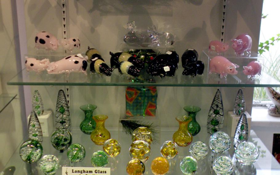 One of the many display cases at Langham Glass offers creations in many sizes. Langham Glass adds new pieces to its product line each year.