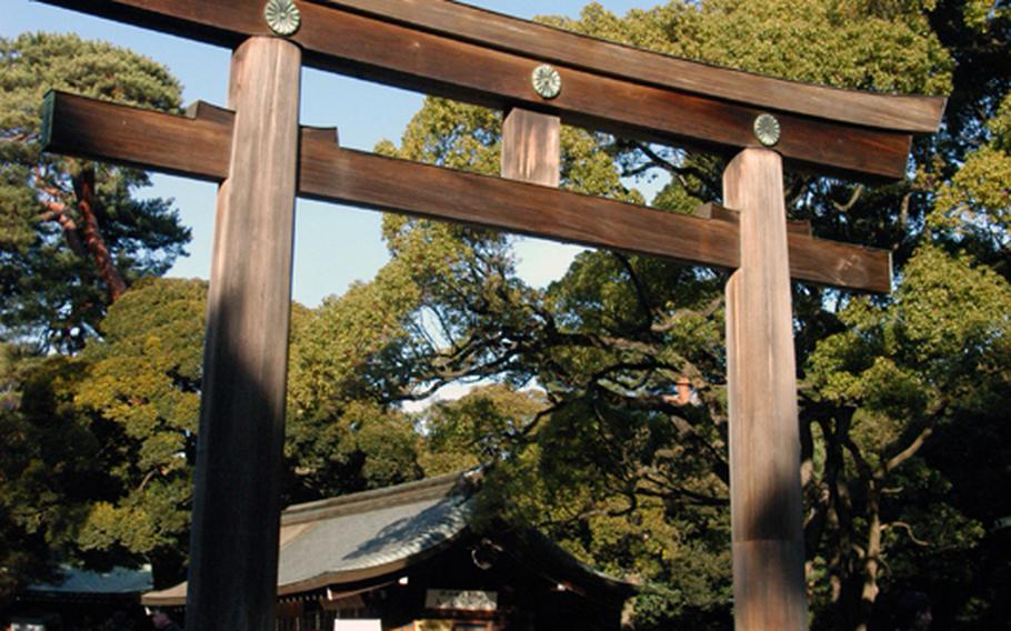 A shrine gate, or a torii, is said to separate the daily world from the sacred world. Toriis, like this one at Meiji Jingu in Tokyo, Japan, can be found at most shrines throughout Japan.