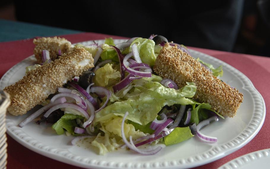 The toscanella salad at Pizzeria Ristorante Gabriella in Landstuhl included three blocks of fried sheep cheese coated with a sesame seed crust.