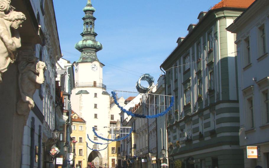 Michael's Gate is an ancient defensive watch tower now watching over shoppers in Bratislava's bustling city center. It was once one of four entries to the city, but it is the only one standing.