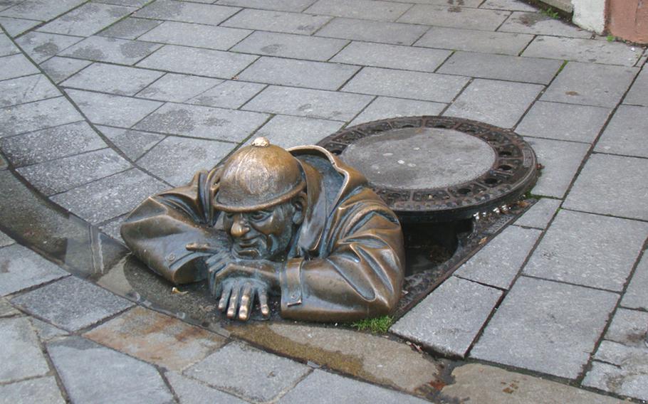 Bratislava's streets offer interesting, sometimes quirky art, such as this sculpture called 'The Peeper.' The lively city also has terrific art museums and galleries,