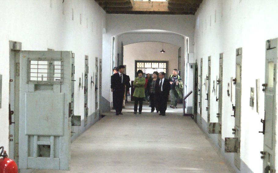 Koreans take a tour of the cells at Seodaemun Prison. The prison was transformed to a museum in 1998. 