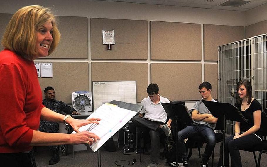 Rebecca Brashier, a jazz vocal director from Boeblingen Middle School in Stuttgart, Germany, works with jazz chorus students at the annual jazz seminar for Department of Defense Dependents Schools-Europe high school students.