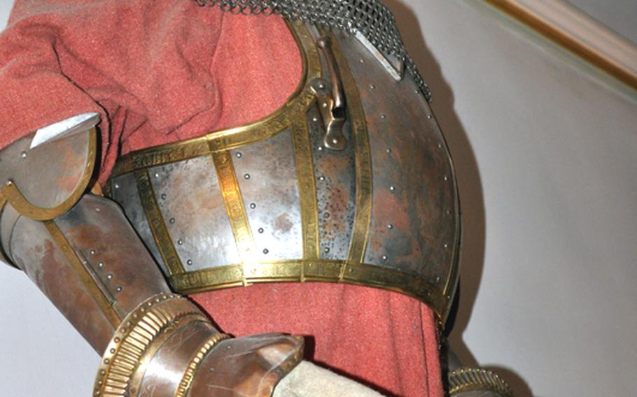 Medieval armor hangs on the wall in one of the rooms at Burg Rabenstein.