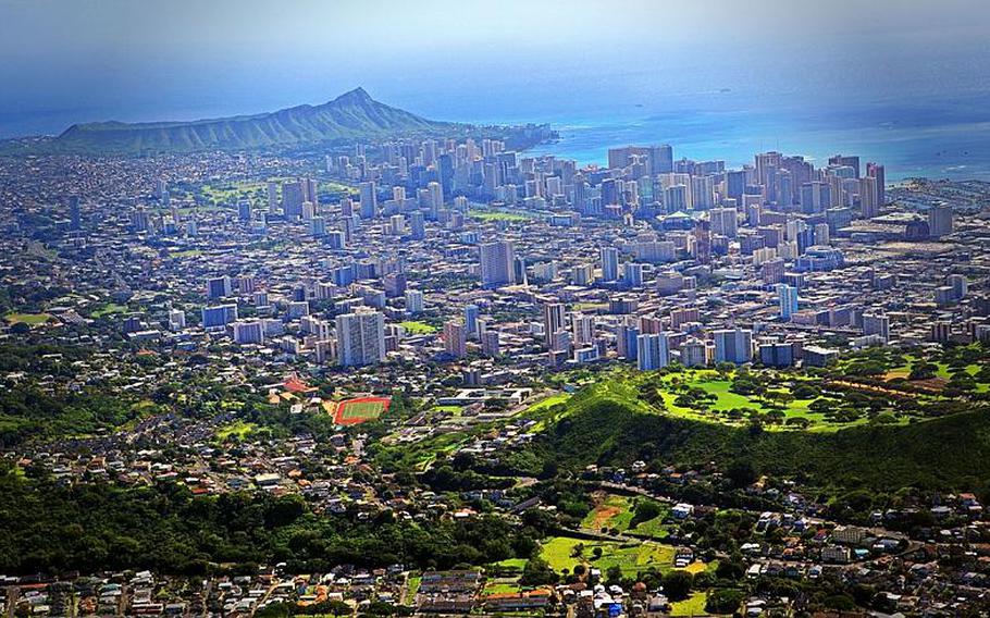 Jan. 04, 2011
 A view of popular island landmark Diamond Head, Waikiki and the rest of central Oahu as I took my very first helicopter tour around the island of Oahu.