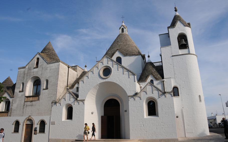 The exterior of the main cathedral in Alberobello, a UNESCO World Heritage site, follows the design of the roughly 1,500 trulli homes and buildings.