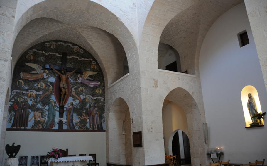 A mural decorates the nave of the main cathedral in Alberobello, in the Apulia region of southern Italy.