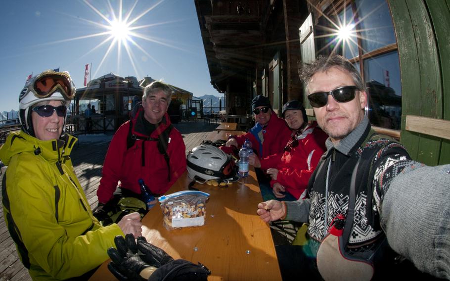 Members of the Heidelberg International Ski Club -- from left, Dawn Darrow, Jeff Darrow, Ron and Steffanie Paolette (in back) and Rick Bumgardner -- relax during a trip to Kitzb?hel, Austria, last season.