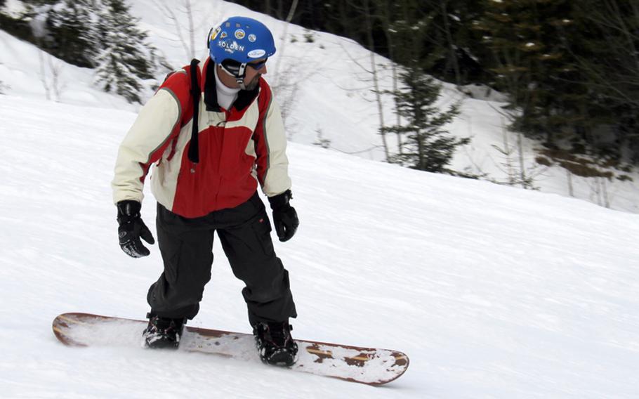 Ski patroller George Roos, glides downhill during National Ski Patrol training session with members of the Heidelberg International Ski Club at Bichlbach Austria last season.