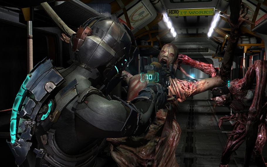 Isaac Clarke takes aim at a necromorph in 'Dead Space 2.'
