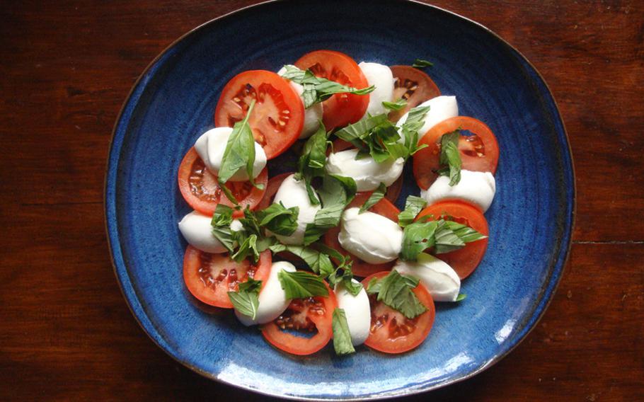 The second course, a Capri Salad, depends on fresh ingredients: Fresh tomatoes, fresh mozzarella di buffalo cheese, fresh basil.