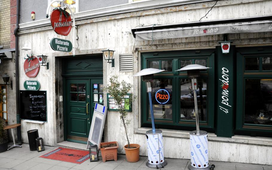 In the evening, outdoor seating is available at Pizzeria Il Pomodoro in downtown Stuttgart and the crowd shifts from business people taking a break to a younger, more casual crowd relaxing after work.