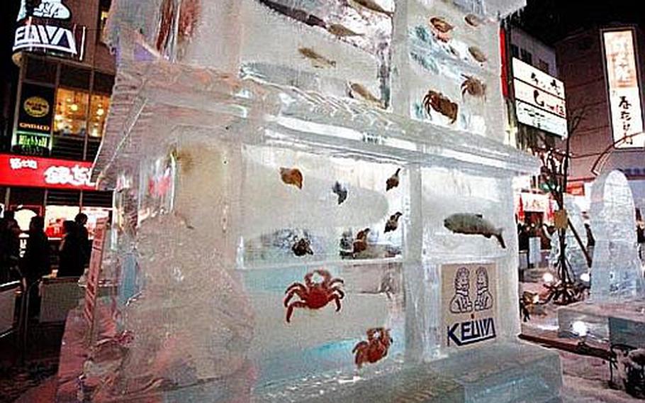 Some artists used more than just ice to wow the crowds at this year's annual Snow Festival in Sapporo, Japan. This sculpture featured plenty of the seafood the city is famous for.