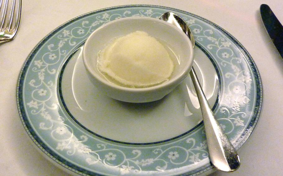 A scoop of sherbet swimming in marc de Gewurztraminer, a fruit brandy, helped clean the palate between appetizer and main course at the Au Cheval Blanc in Niedersteinbach, France.