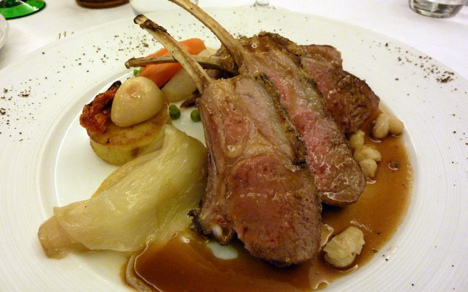 The main course: An herb-crusted rack of lamb served with white beans, leek and garlic was one of the main courses at the Au Cheval Blanc in Niedersteinbach, France.