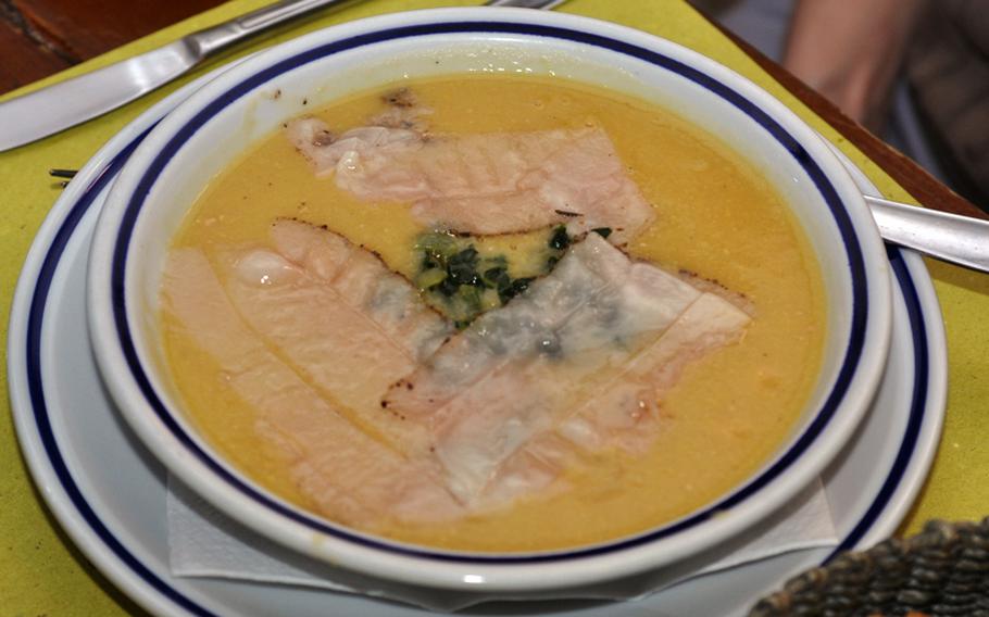 A garbanzo bean and chicory soup (with strips of bacon fat on top) was one of the first-course offerings at Osteria L'Anfora, a small restaurant in Padua a few blocks away from Piazza Erbe.

Kent Harris/Stars and Stripes
