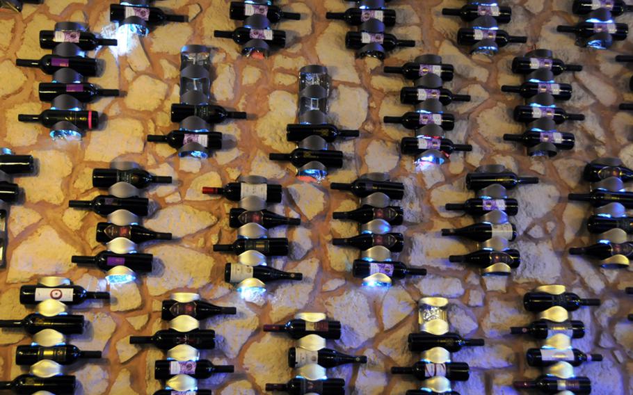 Owners of Ristorante Poseidone boldly -- and modernly -- display their wine collection on one wall of the main dining room.