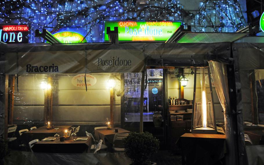 The Ristorante Poseidone in Naples, Italy, is just down the street from the  Castel Dell'Ovo. Outdoor seating s is available, enclosed and heated during colder months.