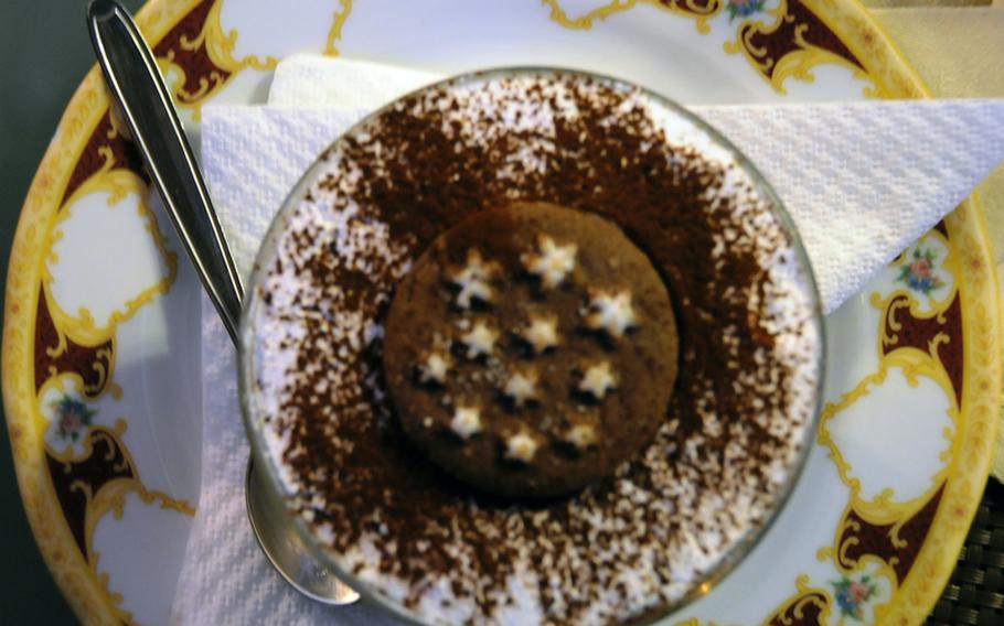 Leave room for dessert, like this Nutella chocolate and whipped cream concoction topped with a chocolate cookie.