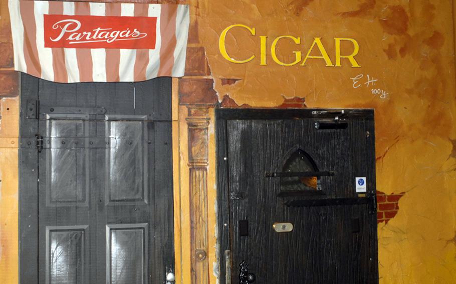 It can be a bit tricky finding the entrance to the Cigar Bar Lounge in Frankfurt, Germany. You have to go down an alley before you come to the entrance doors.  it is near Frankfurt&#39;s Old Opera House.