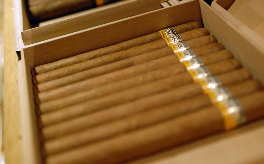 A row of Cuban Cohibas on display inside the Cigar Bar Lounge&#39;s temperature- and humidity-controlled walk-in humidor.  The lounge in Frankfurt, Germany, features a wide sampling of drinks and premium cigars.
