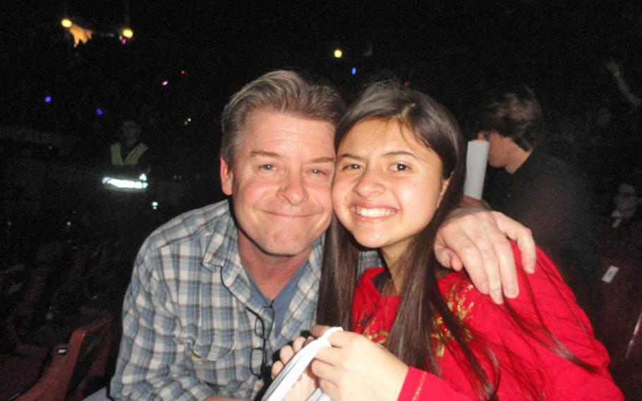 Steven Kalnasy poses with his happy daughter, Jessica, at the Taylor Swift concert at the Mediolanum Forum in a suburb of Milan on March 15. They won tickets to the concerts through a giveaway conducted by Stars and Stripes.