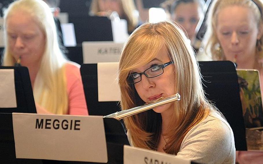 Meggie Rodman, a Hohenfels, Germany, junior, watches conductor Laura Crider as she and the Honors Band rehearse Wednesday. A total of 149 students from Department of Defense Dependents Schools-Europe high schools throughout Europe participated in the weeklong Honors Music Festival in Oberwesel, Germany.