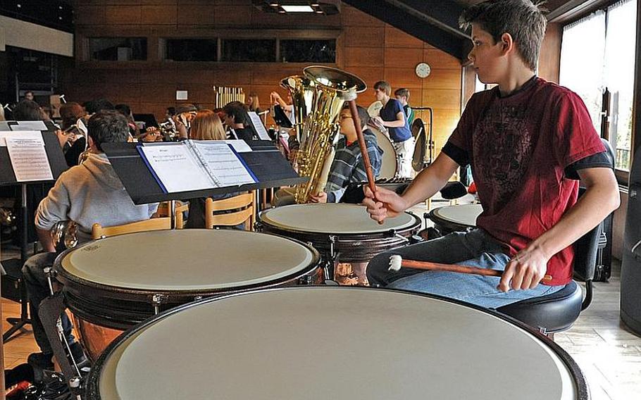 Ankara, Turkey's Joshua Krause hits the kettle drums during a rehearsal with the DODDS-Europe Honors Band on Wednesday. A total of 149 students from Department of Defense Dependents Schools-Europe high schools throughout Europe participated in the weeklong Honors Music Festival in Oberwesel, Germany.