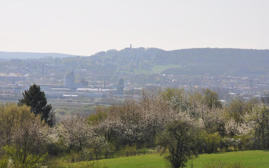 The city of Bamberg, topped by Altenburg castle, can  be seen from the Kreuzberg hillside outside the city. The hills are frequented by local bikers and easy to reach from the city.