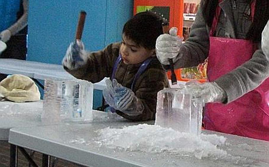 Natalya and Diego carve mugs out of blocks of ice during a trip to the Ice Gallery in Seoul. 