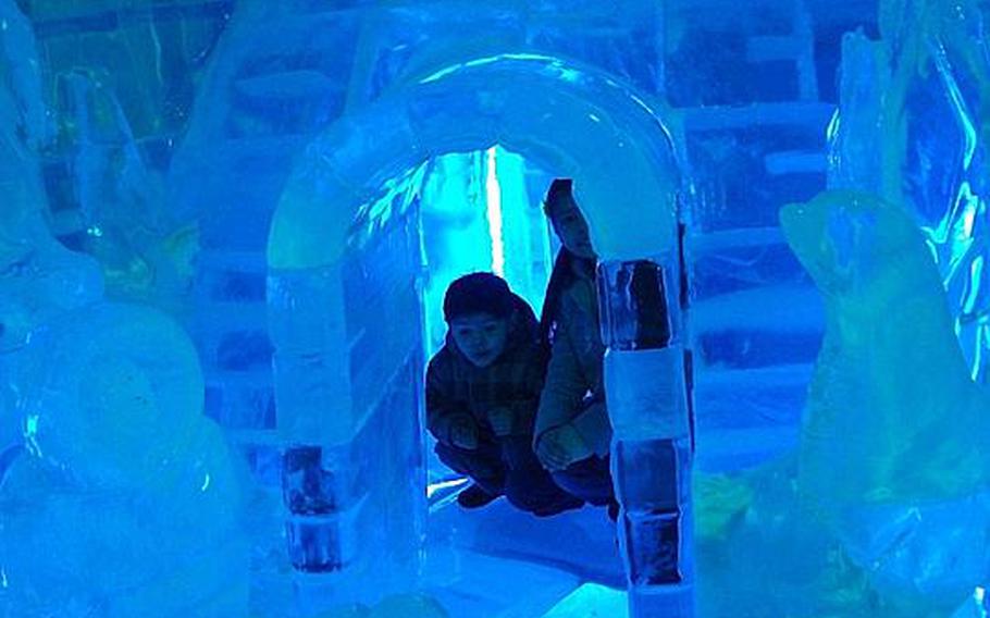 Natalya and Diego get inside an igloo during a visit to the Ice Gallery in downtown Seoul.