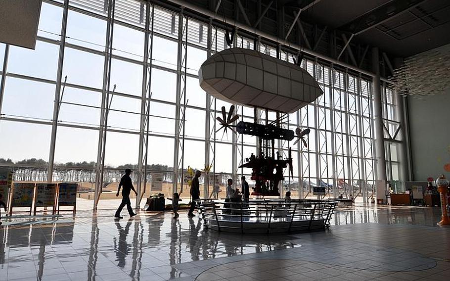 Visitors walk through the foyer of the Misawa Aviation and Science Museum Aomori on April 10. The museum -- about a 10-minute drive from Misawa Air Base -- is a popular weekend destination for kids of all ages.