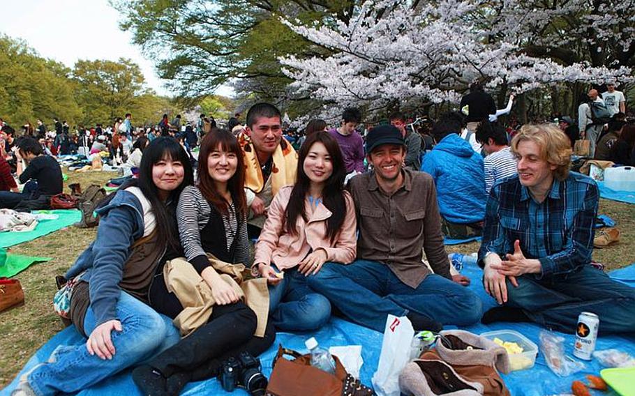 Thousands of people gathered in central Tokyo's Yoyogi Park to enjoy hanami.