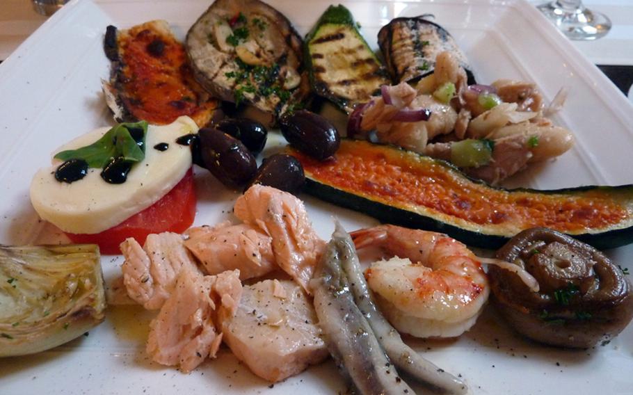 A selection of hors d&#39;oeuvres from the showcase was a first course recently at the Casa Leonardo in Geilenkirchen. It included roasted vegetables, mozzarella, olives, fish and seafood.

Michael Abrams/Stars and Stripes