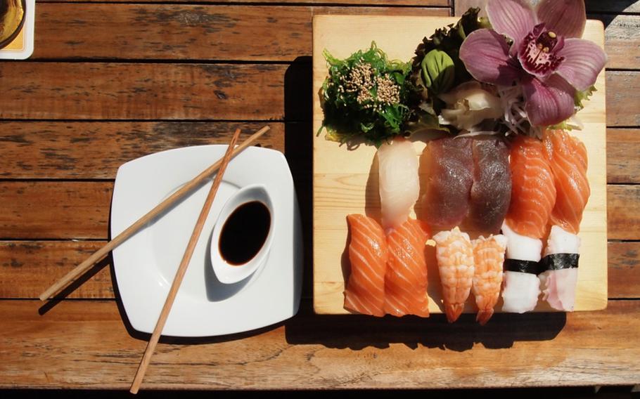 The nigiri sushi plate from Tiffany Thaistyle restaurant in downtown Stuttgart, Germany, comes with 12 pieces of sushi for 16 euros. It was fresh and well displayed on the day we had lunch there.