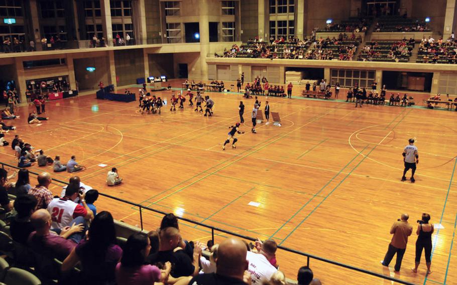 About 800 people attended the first Kokeshi Roller Derby event May 14 at Comprehensive Park on Okinawa.