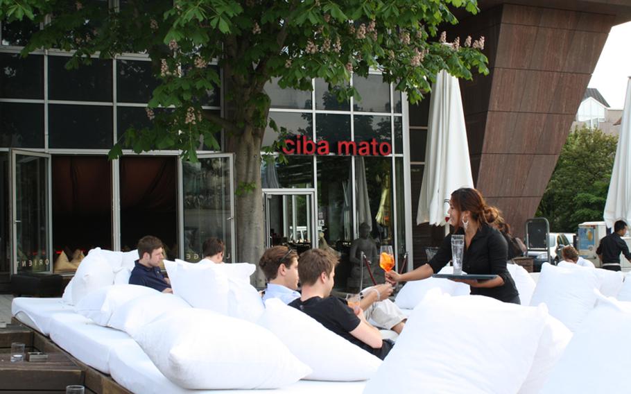 At Ciba Mato, cocktails and dinner can be enjoyed outside on comfortable couches. It's a great place to lounge around for an easy-going evening out.