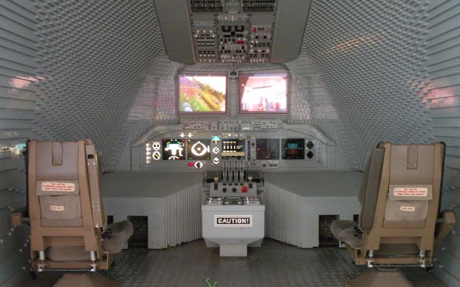 The cockpit of what appears to be a large passenger jet is made entirely out of Lego blocks at Legoland Windsor.

s