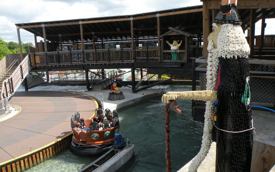 Life-size Lego Vikings peer down on park-goers at Legoland Windsor near London. The 150-acre theme park offers a multitude of rides and games.