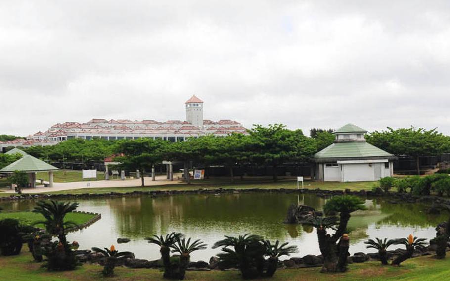 A large pond is located inside the park where turtles sun bake on rocks in the sun. The Okinawa Prefectural Peace Memorial Museum can be seen in the background.