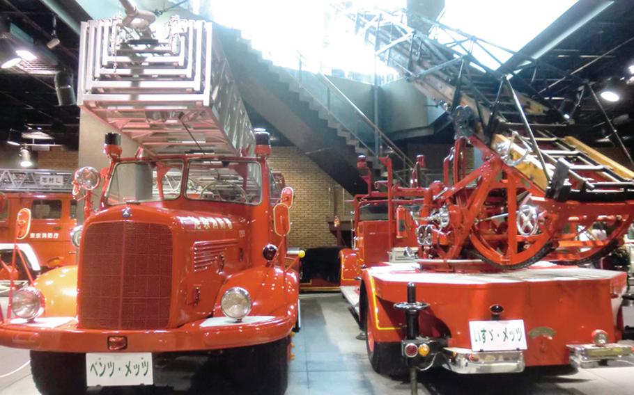 Two of the firetrucks on display on the bottom level of the Tokyo Fire Museum.