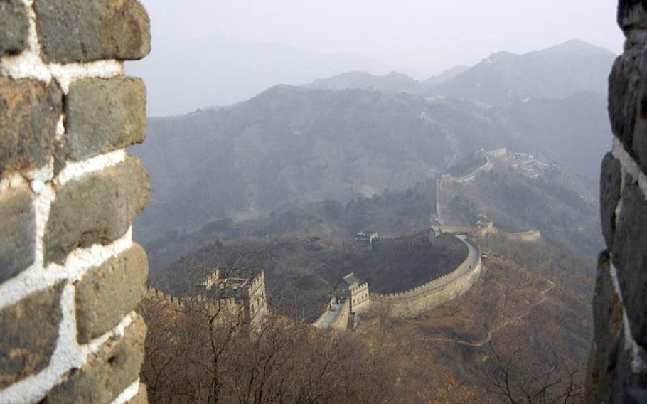 The stunning view of the Great Wall of China stretches as far as the eye can see. The restored section, Mutianyu, is about 1.5 miles long.  Its name means “Admire Fields Valley” and has more towers than the other sections open to the public.